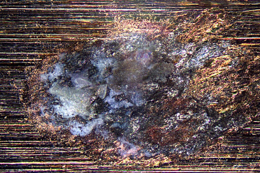 Salt contamination on the surface of an electroplated aluminum/silicon (Al/Si) material inspected with an optical microscope. Image is courtesy of Gerweck GmbH, Germany.