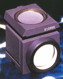 Complete Leitz filter cube (block) for fluorescence microscopy containing an excitation filter, dichroic beam splitter, and emission (barrier) filter.