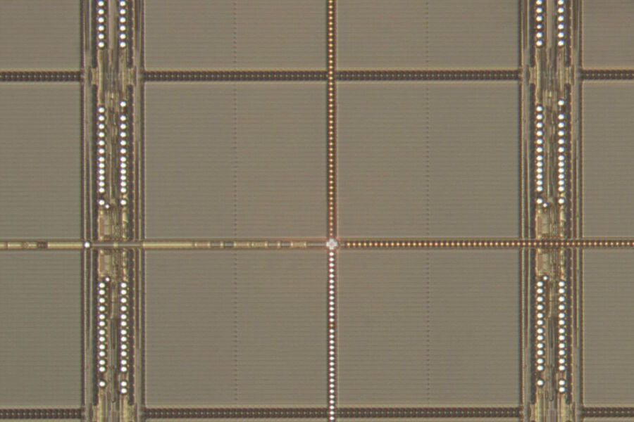 Optical microscope image of a wafer showing a surface overview at low magnification (with 0.7x Macro objective) and a large field of view with the goal of finding an area of interest during inspection.