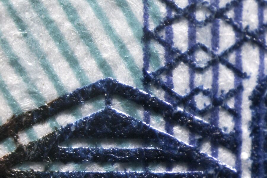Detail of a bank note (embossed elements).