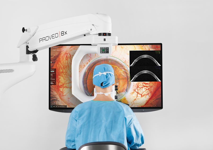 An ophthalmic surgeon performing a 3D heads-up cataract surgery with the Proveo 8x digital microscope and C-arm design, demonstrating reduced neck strain.