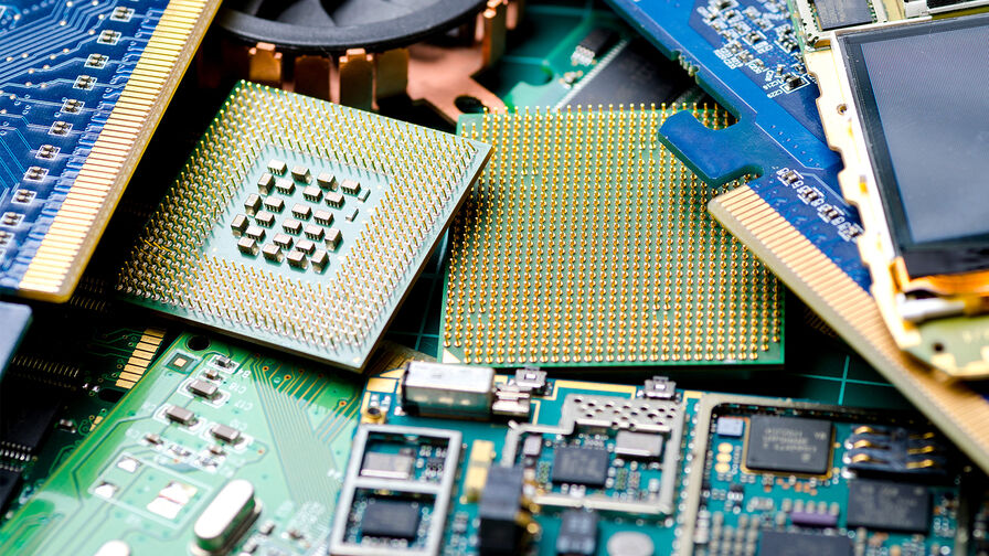 Photo of a pile of electronic boards from which metals can be extracted