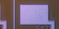 Inspection of an IC-patterned semiconductor. Image of the same region acquired with oblique illumination.