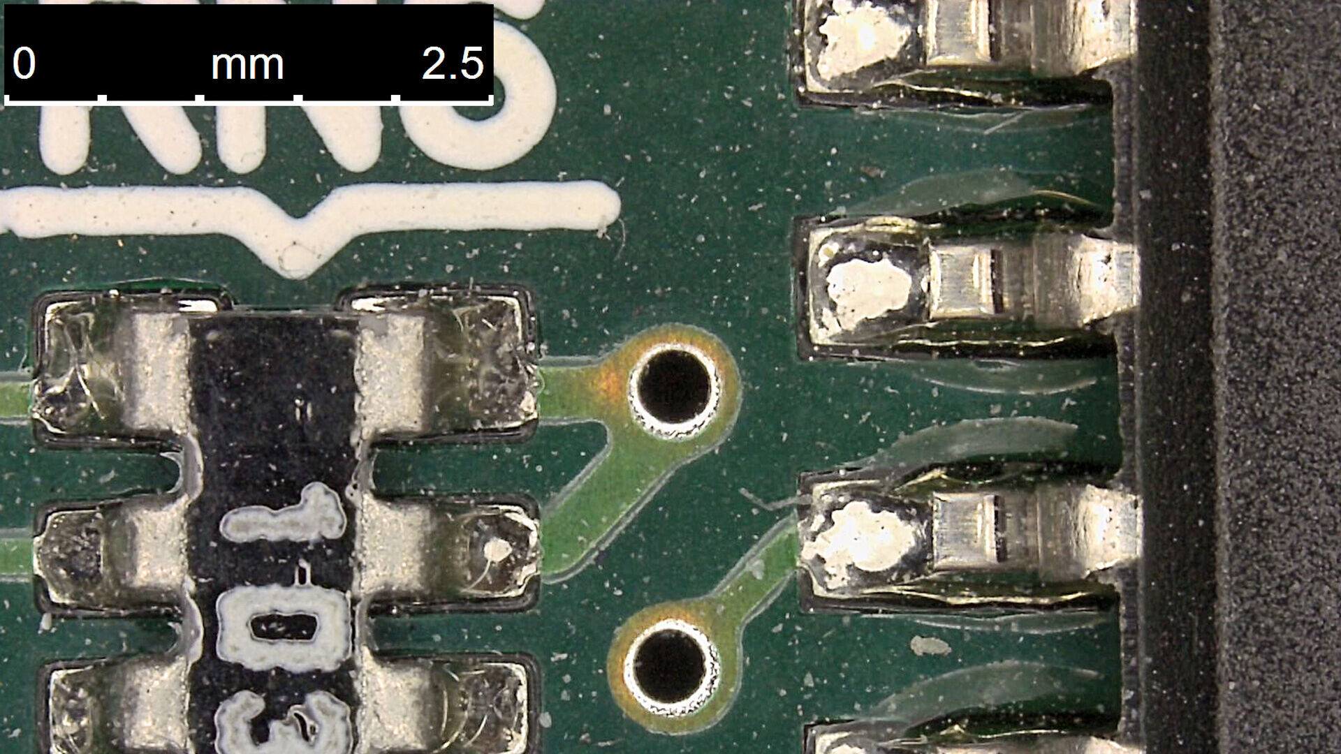 Glare from the varnished fiber-glass-epoxy PCB substrate is greatly reduced. The same PCB area inspected with the DVM6 using ring light illumination and a diffusor