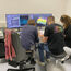 Irmtraud Steinmetz (left) from Leica Microsystems with Stephan Müller (middle) and Jessica Kehrer (right) from Heidelberg University at the STELLARIS 8 DIVE multiphoton system.