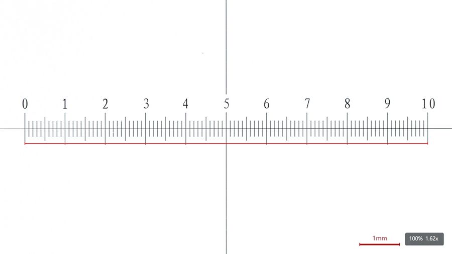 At a lower magnification value, a line in the live image is used to indicate a distance on the stage micrometer to perform calibration.