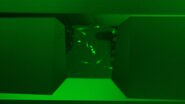 Block-face created by automatic trimming under fluorescence. Mammalian cells of interest, stained with CellTrackerTM Green are visualized within the block-face using the UC Enuity equipped with the stereo microscope M205 FA. In the background a carbon finder grid in black is visible. All samples in the article are created by Felix Gaedke, PhD, CECAD, Cologne, Germany.