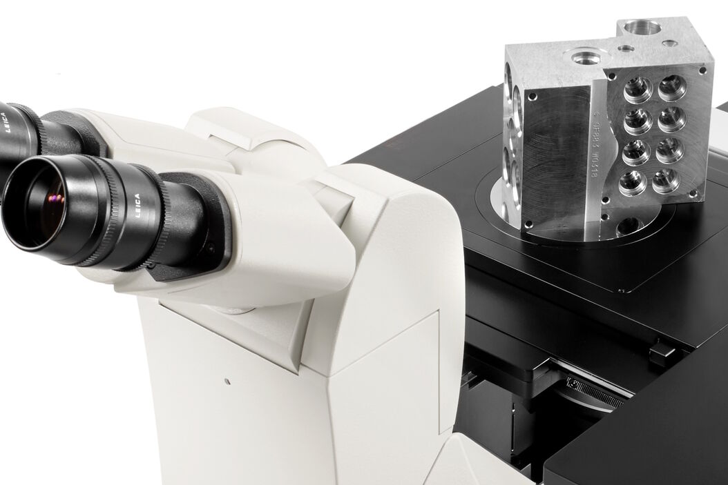 Material sample with a large height, size, and weight being observed with an inverted microscope. Inverted_microscope_with_large_sample_crop.jpg