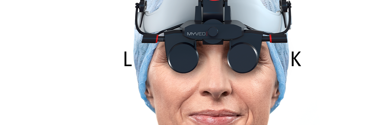 a surgeon wearing the MyVeo surgical headset