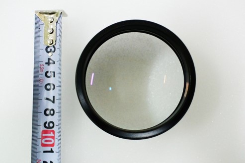 A large-diameter objective lens (68 mm across)