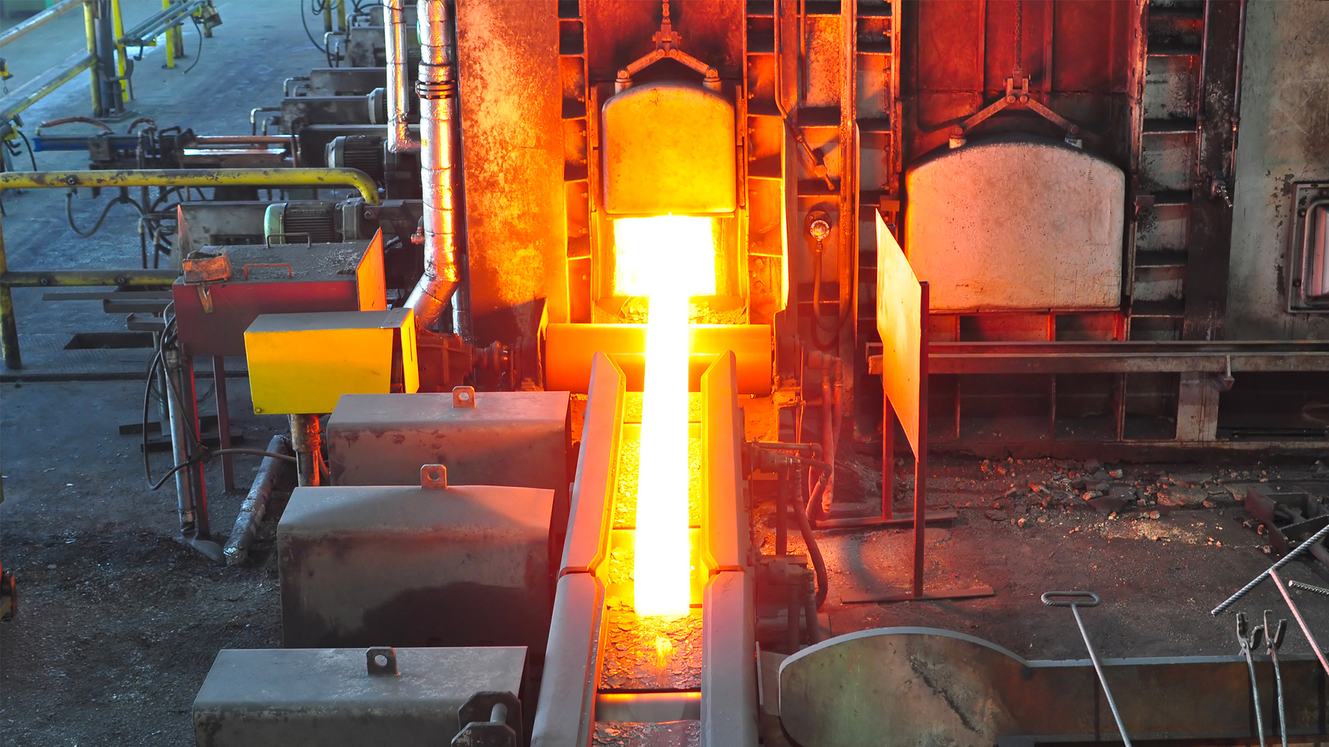 Photo of a sintering process at a steel production plant.